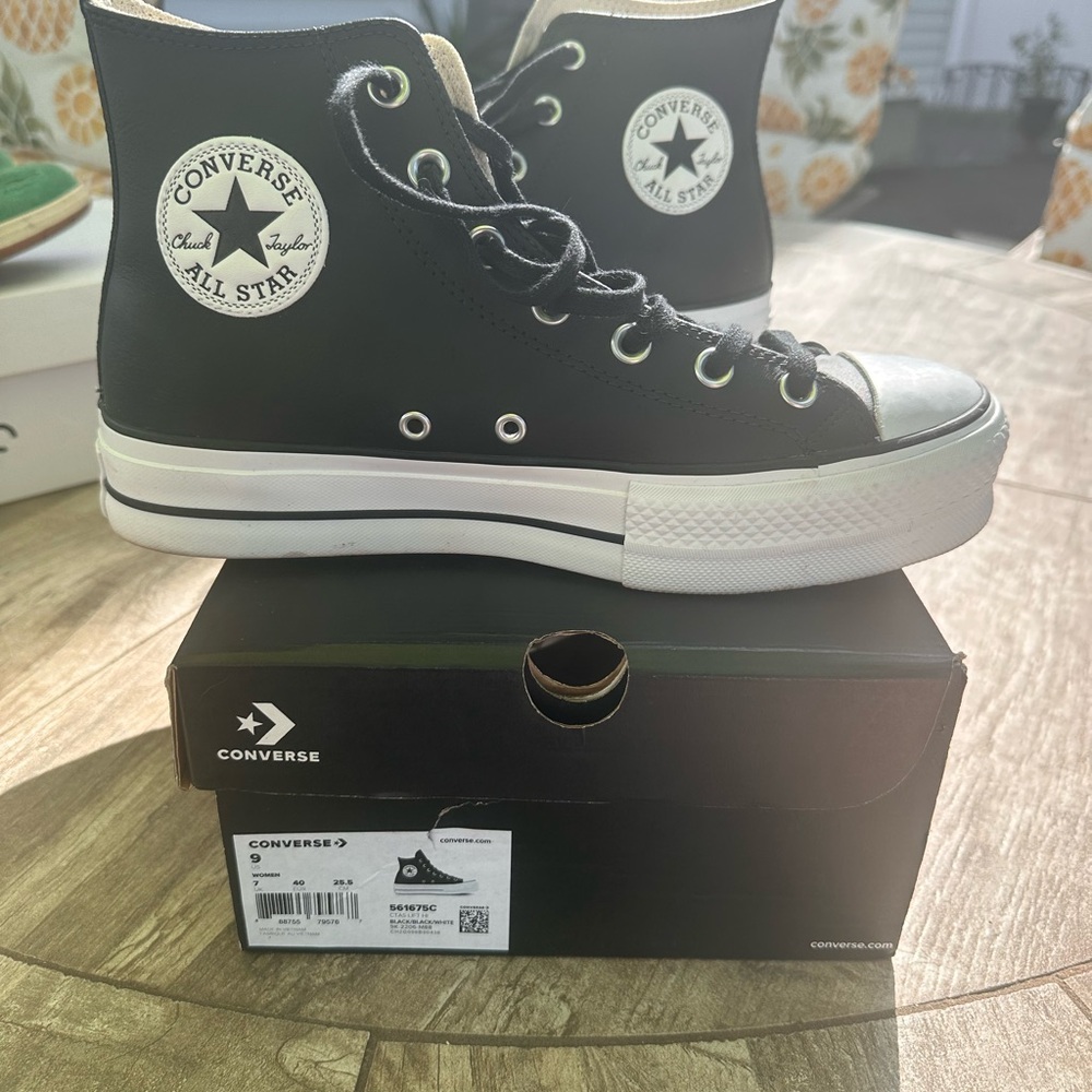 Converse Black and White High-Top Sneakers worn once excellent condition!